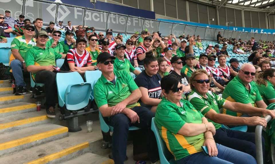 GRAND FINAL FEVER: Members of the Boggabri Roos take their place in the capacity crowd at Sunday's NRL grand final at Sydney's ANZ Stadium. Photo: Supplied 
