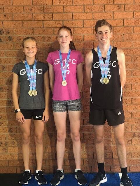 GOLD RUSH: Bella Sawyer, Ellie Thomas and Callum Dear enjoyed great success at the country championships in Dubbo, taking home five medals between them. Photo: Supplied