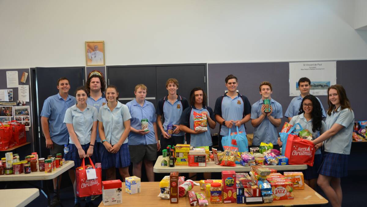St Mary's College students were hard at work putting Christmas hampers together for the St Vincent de Paul Society.