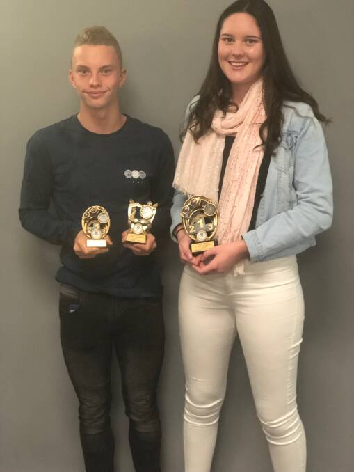 TOP EFFORT: Swimming Gunnedahs Andre Steele and Maddie Coombs received awards at the recent Swimming New England North West presentation night. Absent: Darcy Hannaford. Photo: Supplied 