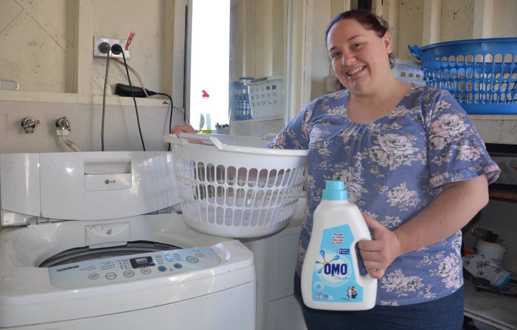 HERE TO HELP: Gunnedah's Katrina Logan is offering up her washing machine to any farmers that are out of water or doing it tough during the drought. Photo: Billy Jupp  