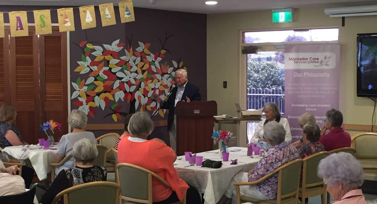 ALL EARS: Jock Nicholson addresses the residents of Mackellar Care at a function on Friday. Photo: Billy Jupp