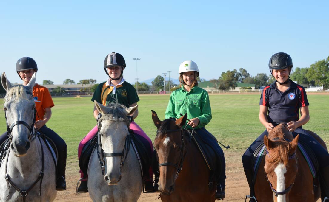 SADDLING UP: Molly Collett, Claudia McConnaughty, Zara Kesby and Kate Brand will represent zone five at this year's Royal Easter Show. Photo: Billy Jupp 