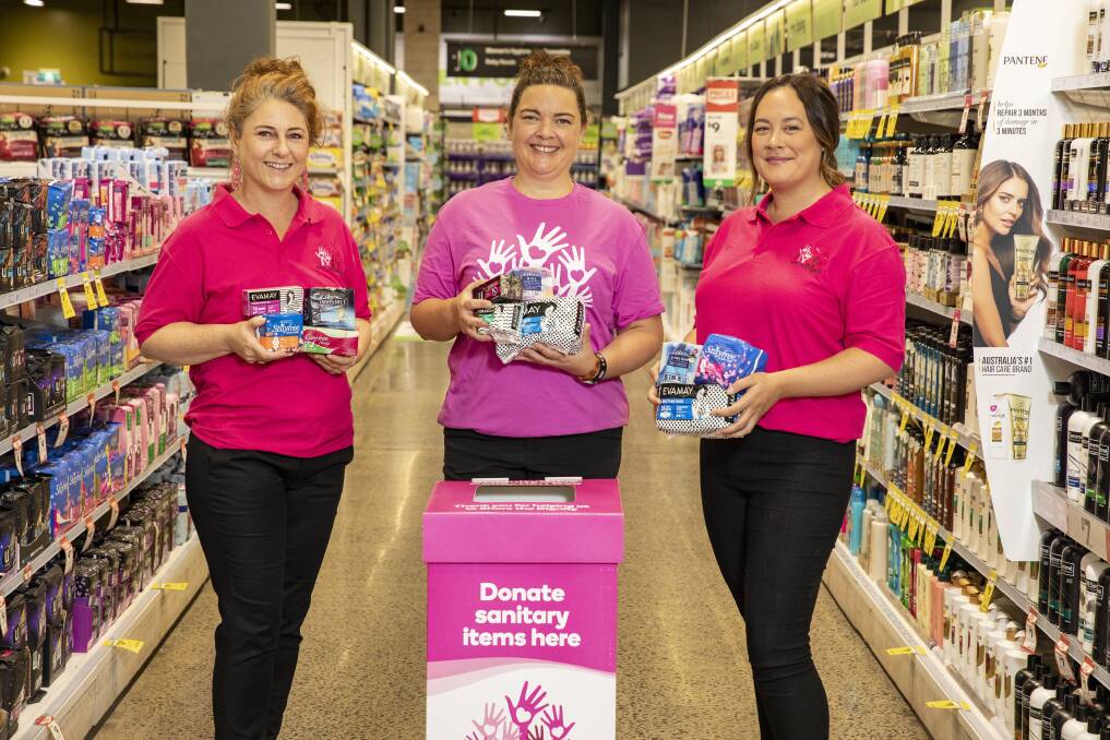 PITCHING IN: Share the Dignity's Christy Nicholls, Samantha Taylor and Cassie Theodorus are calling for people to donate at their local Woolworths store.