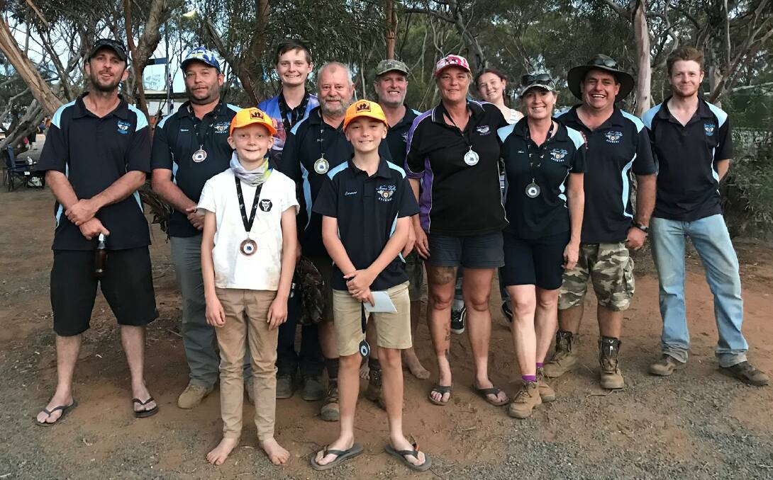 ON TARGET: Members of Namoi Valley Archers celebrate their nationals success. Photo: Supplied 