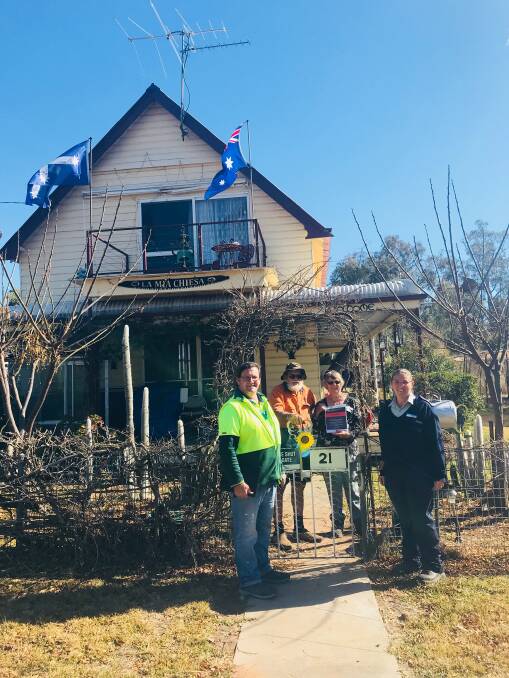 UNDER WAY: Council workers chat with Premer residents as the first stages of council's Premer Pride Project begin on Thursday. Photo; Supplied 