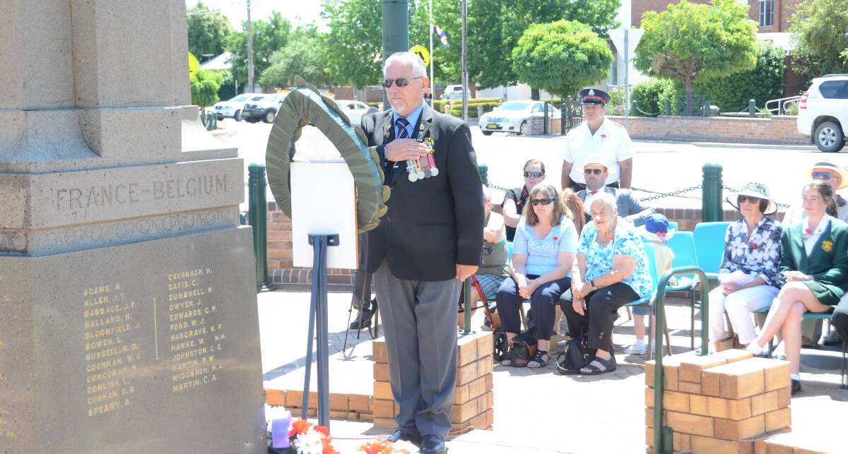 PAYING RESPECT: Gunnedah RSL Sub Branch president Peter Kannengiesser seen here on Remembrance Day will host the 8th division memorial service. Photo: Billy Jupp