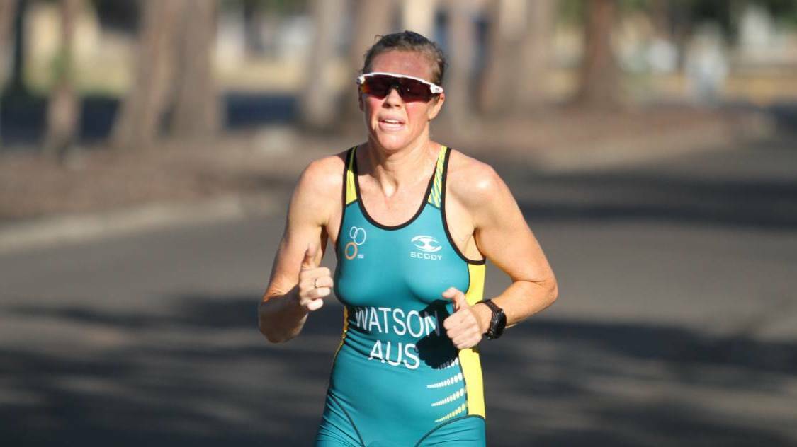 TOP FINISH: Kelly Watson pulled out all the stops to claim a first-place finish in her age group at the Morpeth triathlon. Photo: Mark Bode