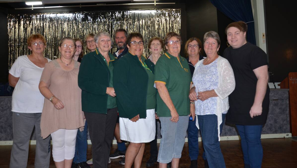BIG EFFORT: Members of The Dance with Travis and Gunnedah Can Assist gather to celebrate the funds raised by the line dancing group in Curlewis on Saturday. Photo: Billy Jupp 