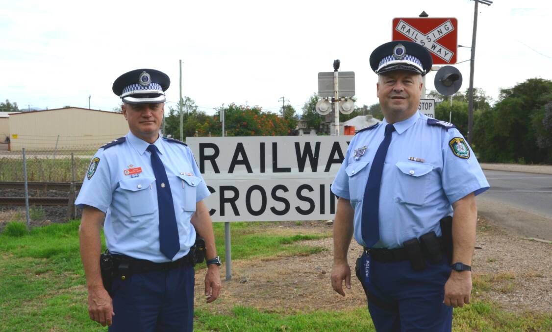 TEAM EFFORT: Inspector Micheal Wurth, pictured left with Senior Sergeant Mick Timms, is urging locals to stay vigilant as the Gunnedah theft rate decreases from December to January this year. Photo: Billy Jupp