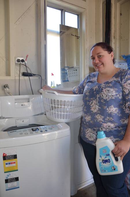HERE TO HELP: Gunnedah's Katrina Logan is offering up her washing machine to any farmers that are out of water or doing it tough during the drought. Photo: Billy Jupp 