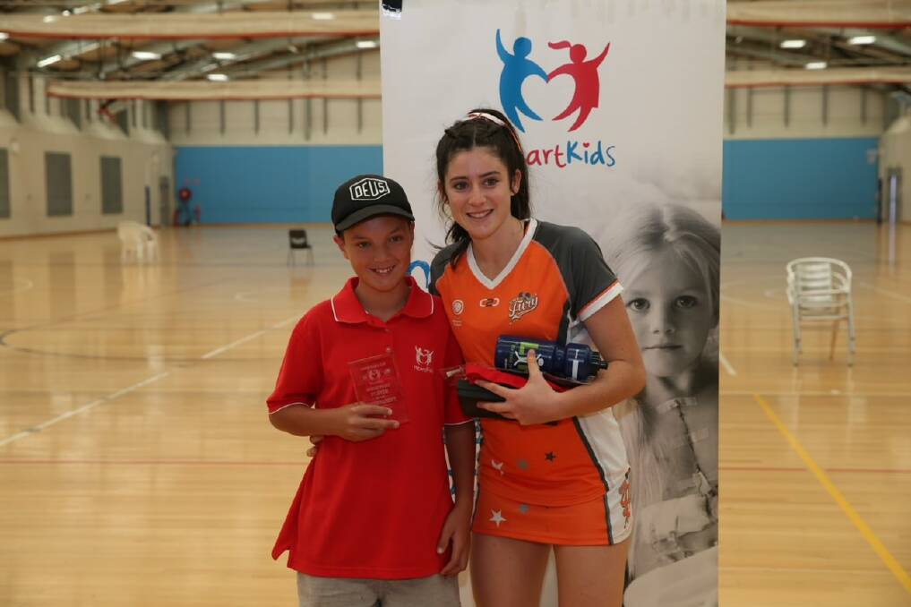 TOP PERFORMER: Perkins claims her award for best player in the 2019 Heart Kids Cup. Photo: Supplied 