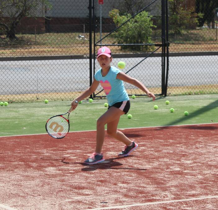 Hitting out: The tennis camp attendees had a ball this week at the three-day Louis Tennis Academy. Photos: Billy Jupp