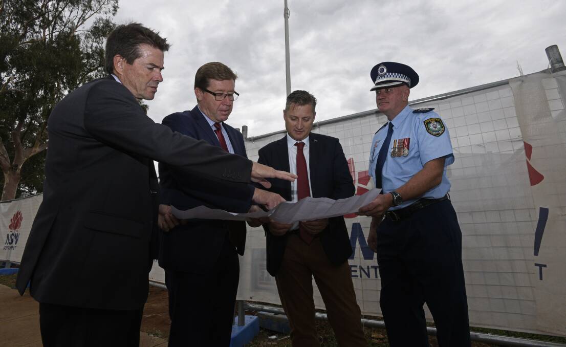 PLANS: Member for Tamworth Kevin Anderson, Police Minister Troy Grant, Gunnedah shire mayor Jamie Chaffey and Inspector Michael Wurth. Photo: Ben Jaffrey 