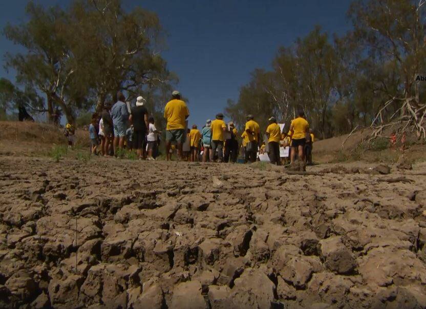River runs dry: Participants in the day of action at Walgett. Photo: NSW Aboriginal Land Council