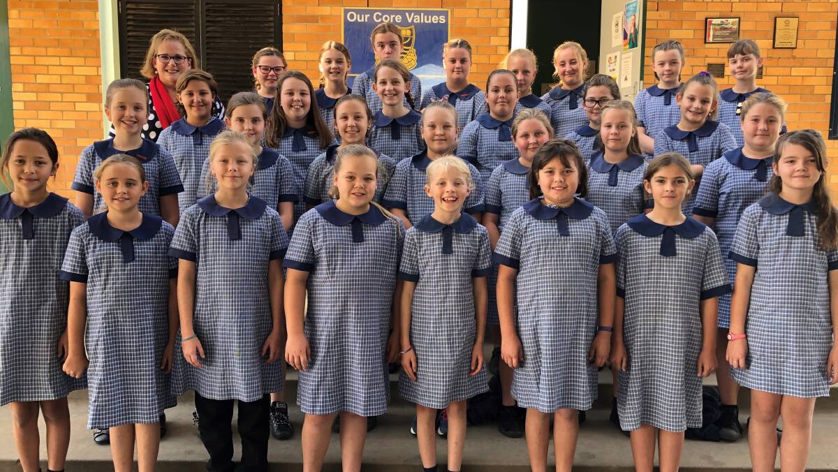 Narrabri Public School primary choir co-ordinator Sharon Stoltenberg with the students who will perform at the Opera House.