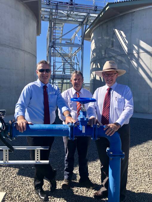 TAPPING IN: Gunnedah shire mayor Jamie Chaffey, council water services manager Kevin Sheridan and federal member for Parkes Mark Coulton at the official opening this morning of the infrastructure. Testing and commissioning will follow before water starts flowing in May.