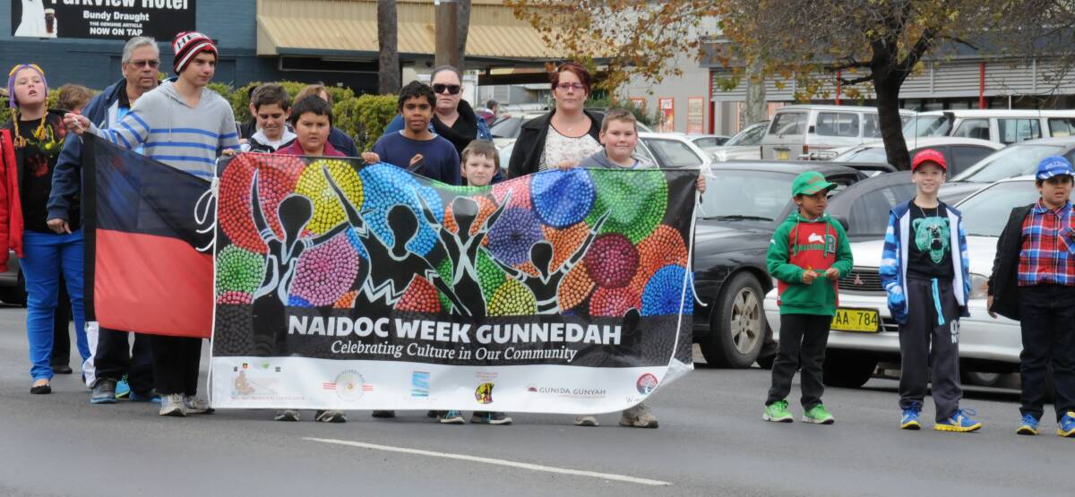 The Gunnedah community marches for NAIDOC Week during a previous year.