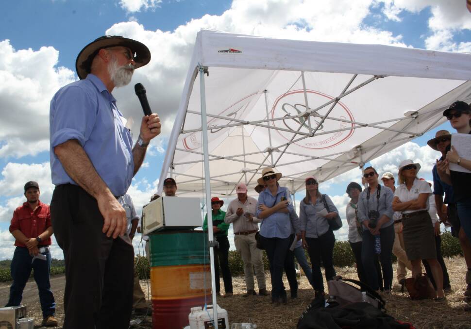 Innovator: Graham Brodie (left) is leading a team researching the impact of microwave energy on weed plants using everyday technology. Here is talking to field day visitors at Pine Ridge.