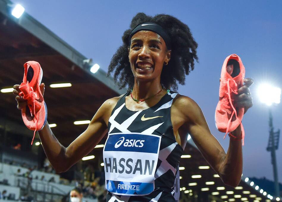 Tools of the trade: Sifan Hassan proudly displays her Nike ZoomX Dragonfly spikes after winning a race this month. Picture: Andrea Staccioli/Insidefoto/LightRocket via Getty Images