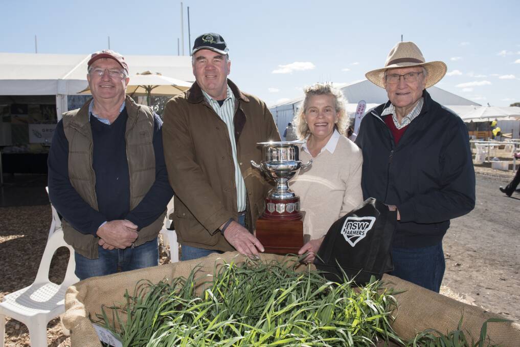 Cup winners: Gordon and David Brownhill flank Brownhill Cup winners Ed and Fiona Simson, who's Premer property was recognised for its commitment to sustainability at Agquip on Wednesday. Photo: Peter Hardin