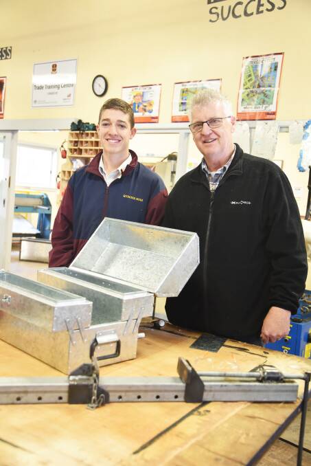 Quirindi High School's Nicholas Hamblin has topped the state in Metal Engineering in the HSC. He is pictured with teacher Wayne Miggins.