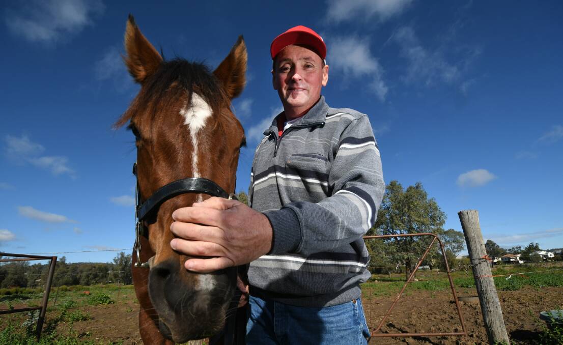 MAIDEN WIN: Michael Craig with Time To Dazzle, who won last start, at his stables in Gunnedah. Photo: Gareth Gardner