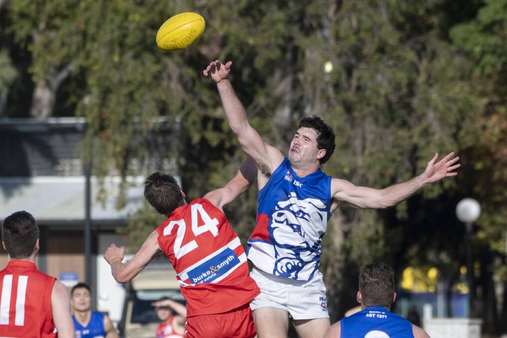 LEAP: Nick Ferguson wins a tap against the Tamworth Swans in their round four clash. Photo: Peter Hardin