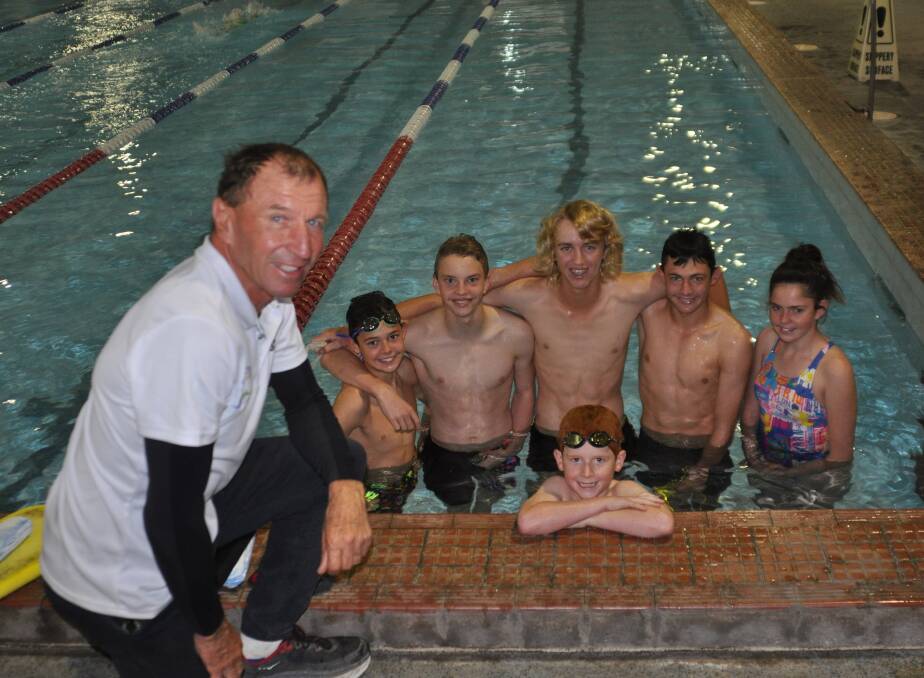 EXPERIENCE: Swimming Gunnedah's new head coach John Hickey with club members Jed Rennick, Andre Steele, Logan Dries, Kurt Rennick, Brooke Rennick and Angus Hobson (front).