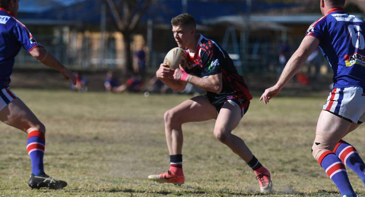 HIGH ALERT: Roosters fullback Jack Rumsby in attack mode in the knockout final against Gunnedah at Kootingal on Sunday. Photo: Mark Bode