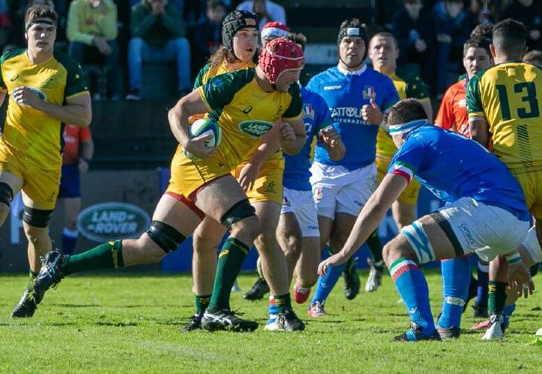 GREEN AND GOLD MACHINE: Wilson goes for a gallop in the 36-12 win over Italy.