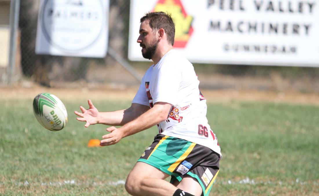 HUNGRY DOGGIE: Aaron Donnelly plays touch on Australia Day. “This [season] is pretty much all or nothing for me," he says. Photo: Mark Bode