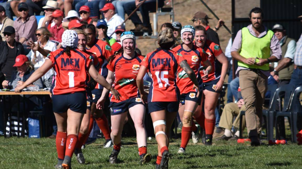 RED TERROR: Gunnedah celebrate their grand final win over Pirates. "You know, it's been a long time coming, and the relief was the first thing [I felt] - and now it's just excitement: we're so excited," says Gunnedah skipper Sarah Stewart. Photo: Ben Jaffrey