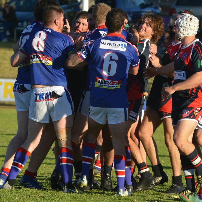 ON YOUR BIKES: Bulldogs No.8 Rory Harding and Roosters No.7 Jordan Sharpe (shaggy hair) are separated after a melee, before being marched.