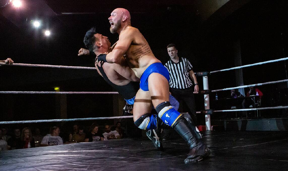 HOMEGROWN: Shaun Blomfield, aka Parker Tomas, in action in the WrestleRevolution Tour, which is coming to Gunnedah. Photo: Sarah Newman
