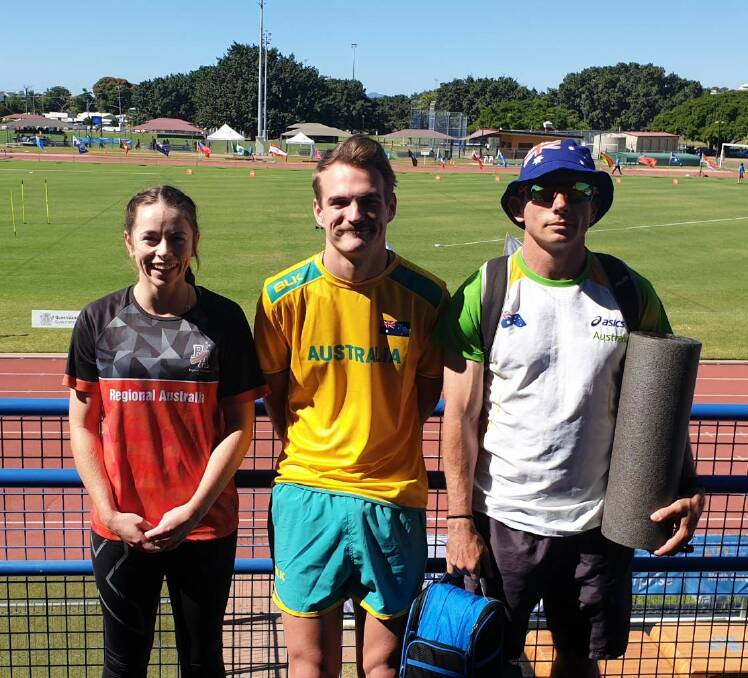 POWER OF THREE: Geddes and his coach, Jay Stone, and fellow Gunnedah competitor Emma Kennedy at the Oceania Area Championships. Photo: Supplied