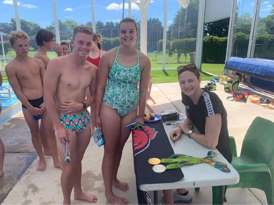 DOUBLE IMPACT: Swimming Gunnedah's Andre Steele and Amelia Lush, who will also contest the championships, meet swimming great Cate Campbell. Photo: facebook