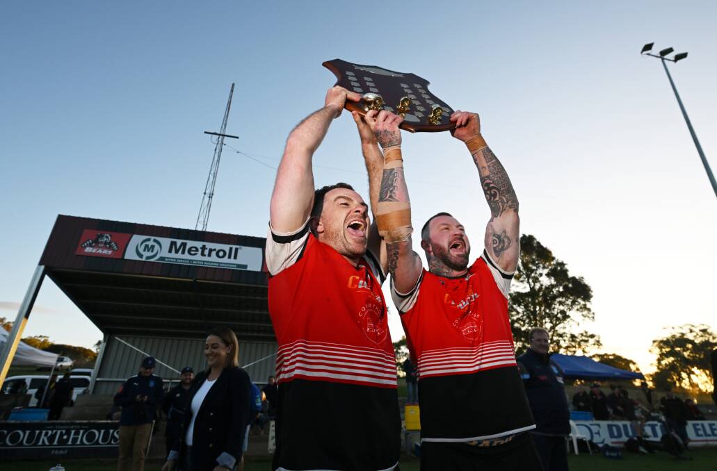Co-captains Josh Schmiedel, right, and Scott Blanch celebrate Norths' 2023 grand final win. Picture by Gareth Gardner