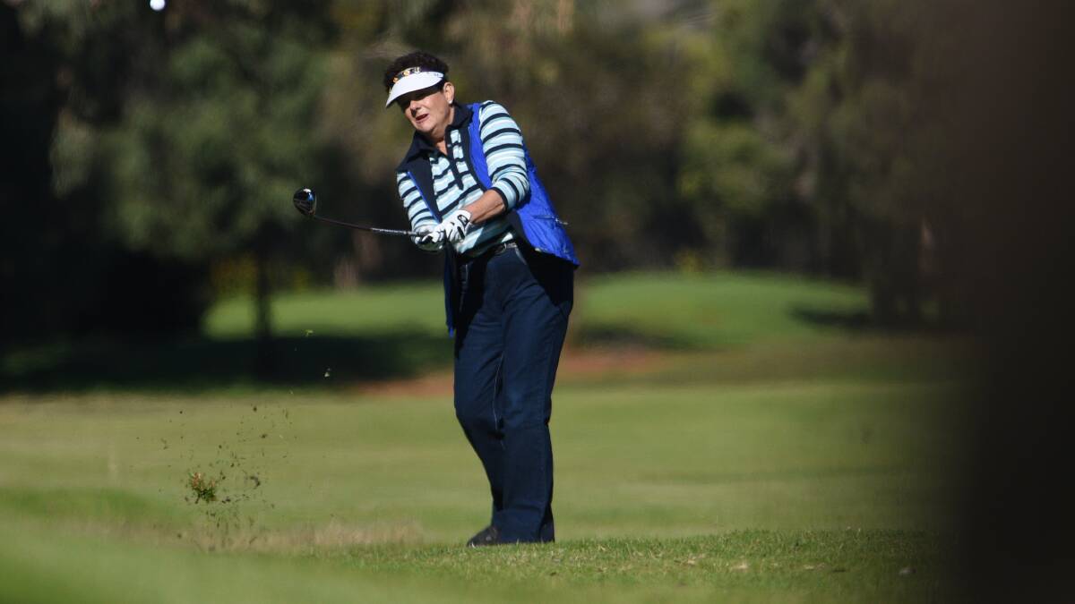 STYLE: Julie Peters, of Tamworth, shows good form from the fairway. Photo: Gareth Gardner.