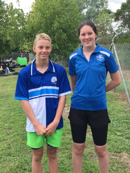 ON SONG: Swimmers Andre Steele and Maddie Coombs are in form.