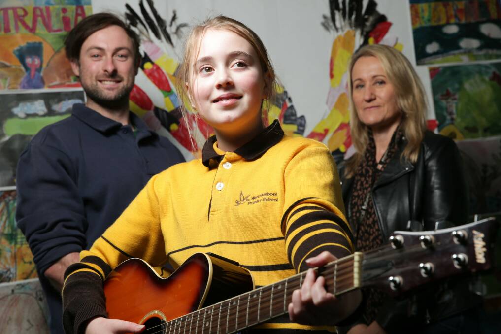 Young talent: Warrnambool Primary School student Henrrietta Barker, 11, pictured with teachers Thomas Fraser and Gina Mills, penned a powerful song to the Stolen Generations. Picture: Chris Doheny