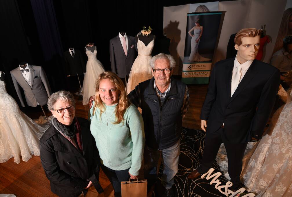 SPECIAL DAY: Stephanie Watson, centre, with grandparents Jann and Ron Wittig at the North West and New England Weddings Expo at Tamworth Town Hall on Sunday. Photo: Gareth Gardner 160717GGC07