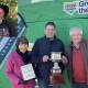Brownhill Cup winner John Kneipp, inset, with his wife Anne and son Philip, holding the perpetual trophy, with Gordon Brownhill at AgQuip.
