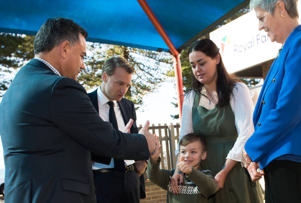Royal Far West CEO Lindsay Cane (right) with Deputy Premier John Barilaro (left) and Member for Manly James Griffin with Dominque and his mum Gemma Callinan, of Harden, NSW.