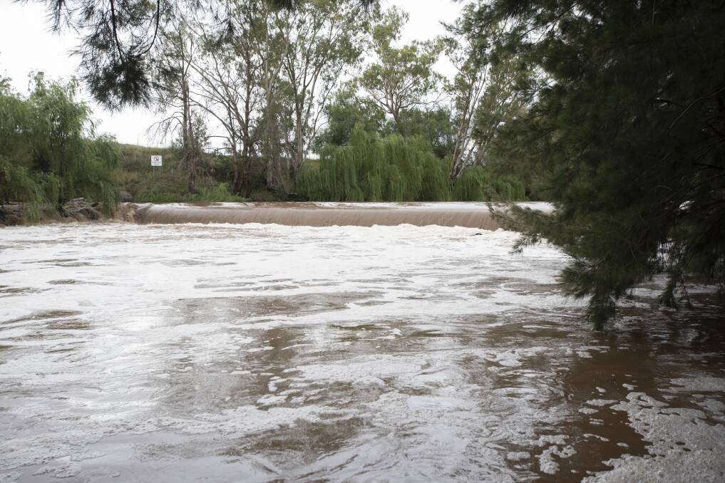 GUSHING: The Namoi River charged over the weir in Manilla after heavy rain drenched the region earlier this week, boosting Keepit Dam. Photo: Peter Hardin