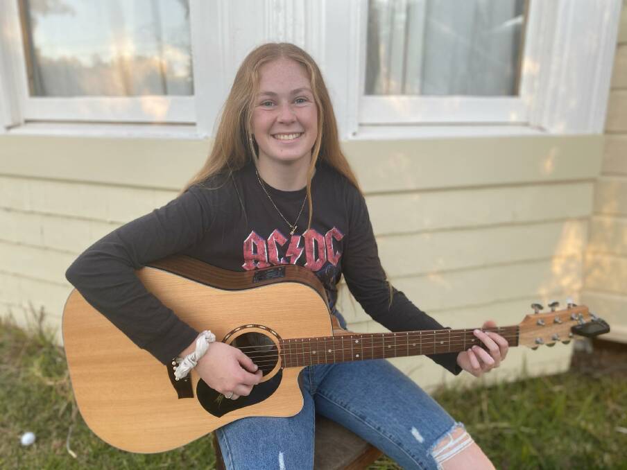 ARTIST AWARDED: Elsie Ford from Narrabri entered a video of her playing guitar and singing her original song. Photo: Supplied