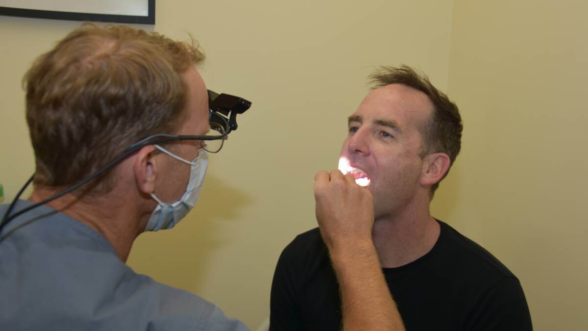 WHOLE PERSON: Doctor Daron Cope and Doctor Niall Jefferson provide ear nose and throat treatment at TAMS. Photo: Andrew Messenger
