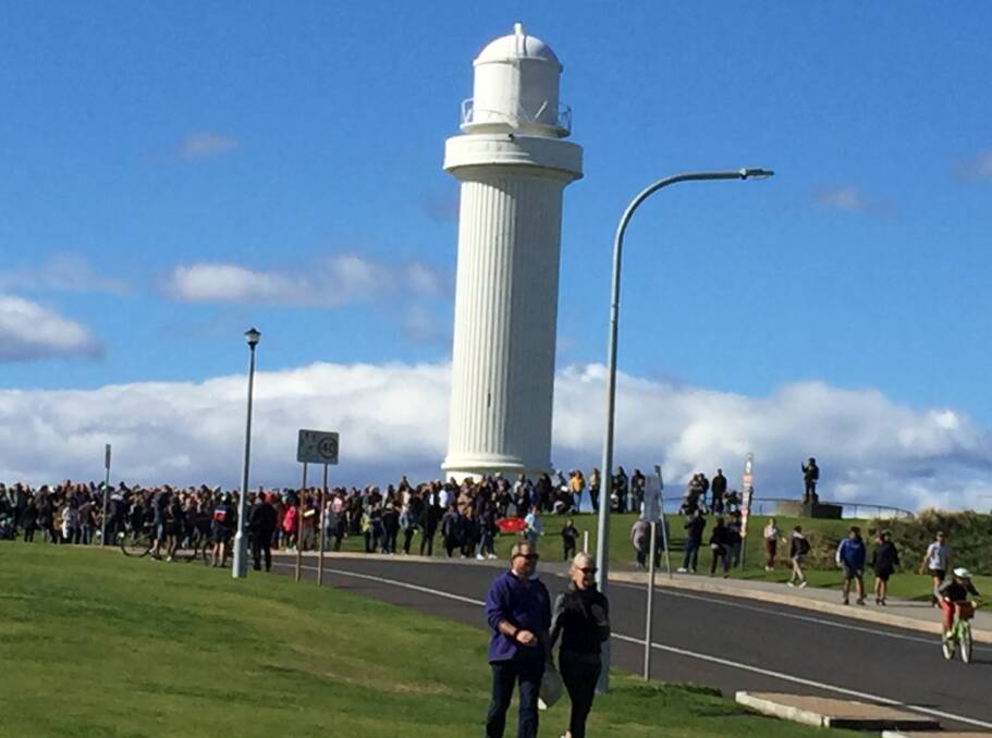 Anti-lockdown protesters at a self-styled "freedom rally" at Wollongong lighthouse on Saturday.