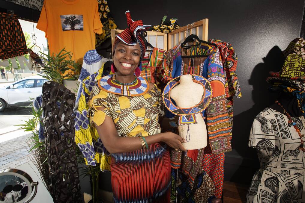 AFRICAN ART: Originally from Tanzania, Anjela Kyungai has made a home in Gunnedah and sells clothing, jewellery and art. Photo: Peter Hardin