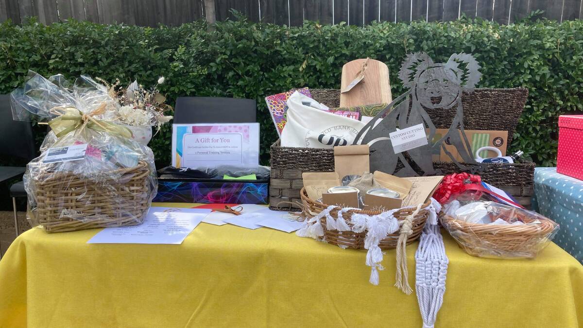 Donated raffle items at the Allawah Cottage wine and cheese night. Photo: Supplied 